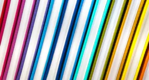 a photo of a rainbow of hardcover books