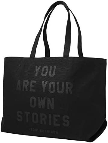 Black tote with text that reads "You are your own stories" -Toni Morrison