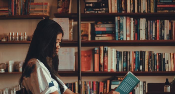 Asian woman reading