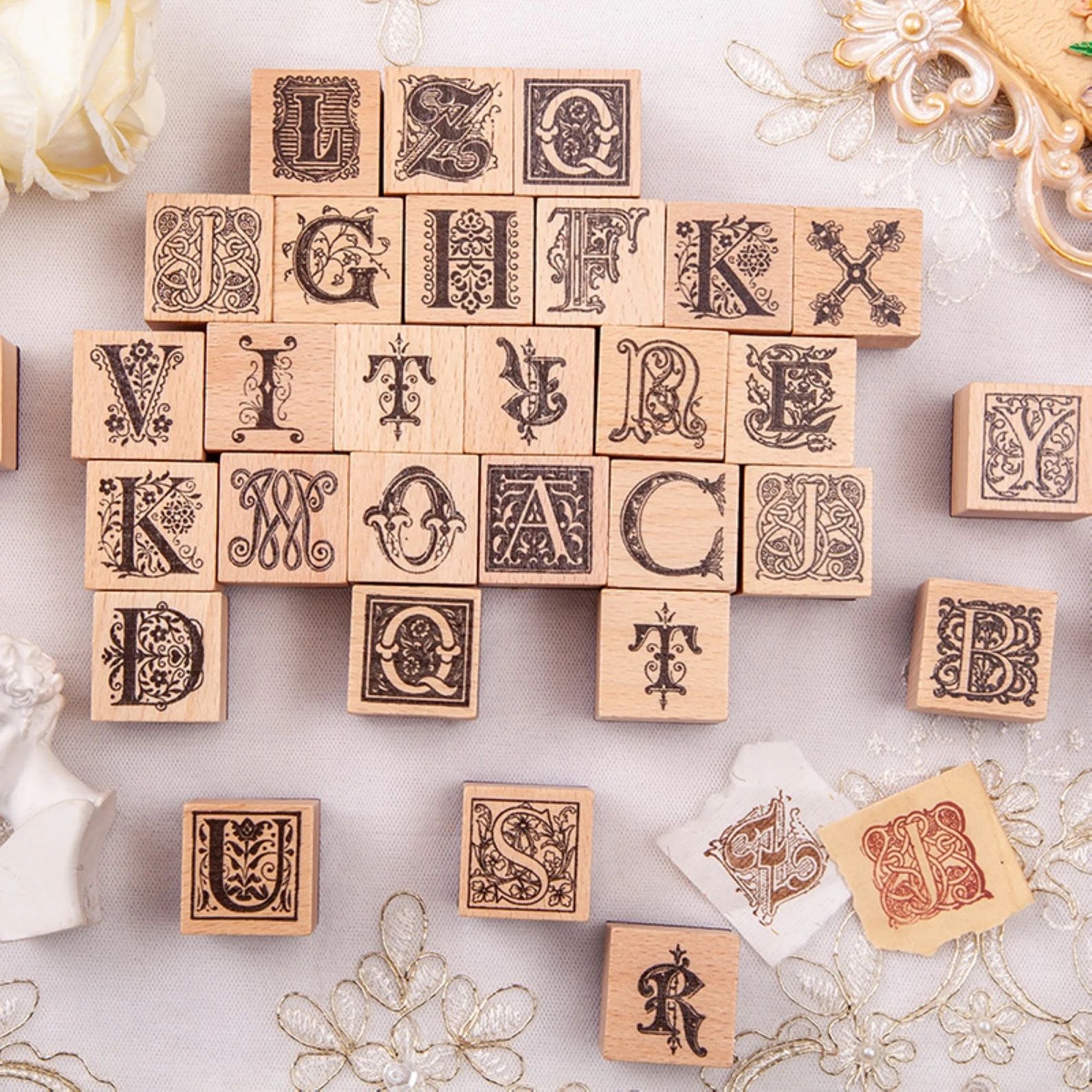 stamps of capital letters to look like illuminated manuscipt letters