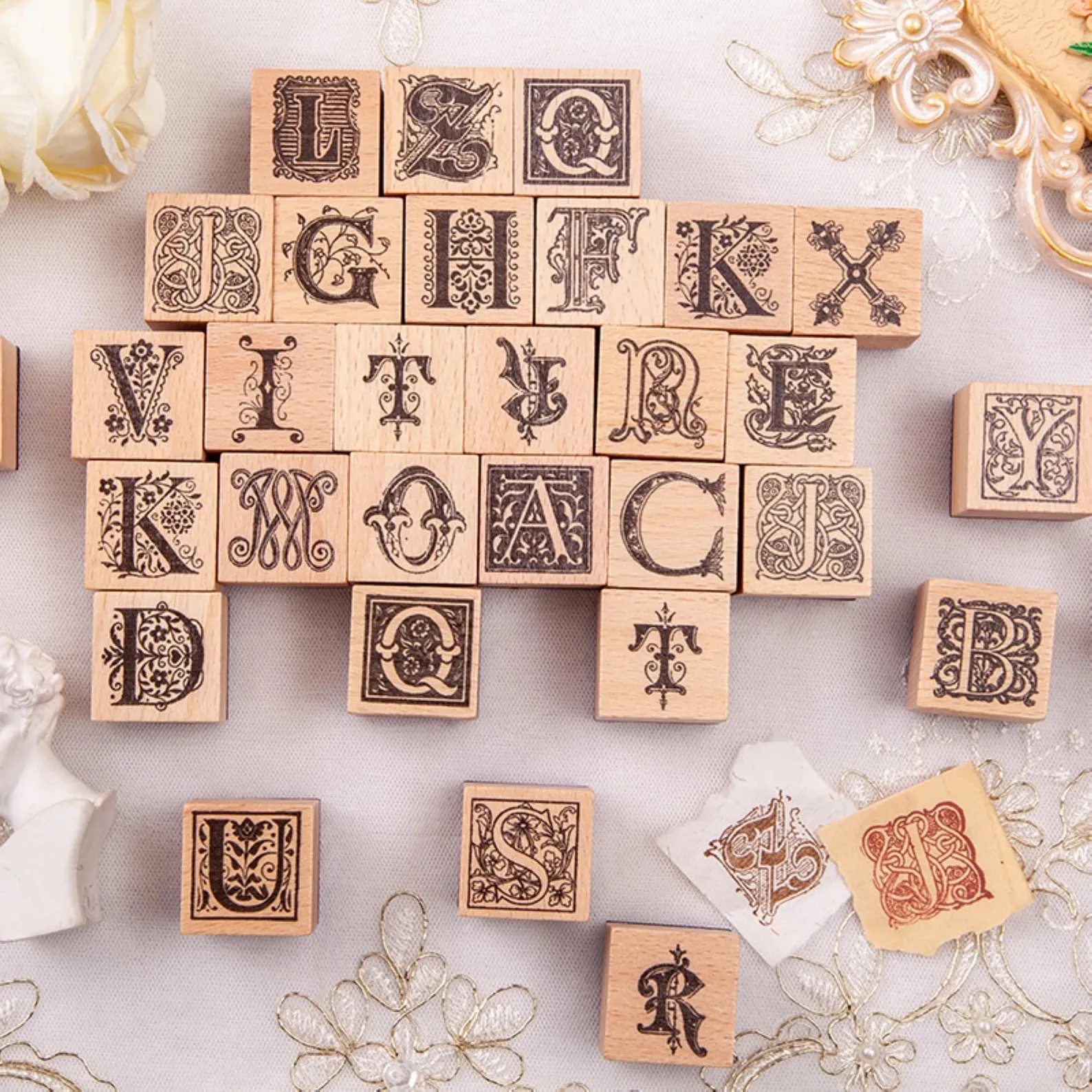 stamps of capital letters to look like illuminated manuscipt letters