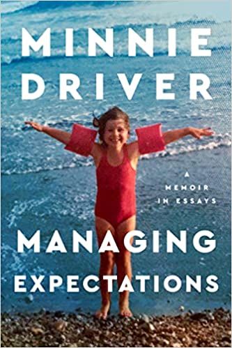 cover of Managing Expectations: A Memoir in Essays by Minnie Driver; photo of the author as a young child, standing in a red bathing suit and swimmies in front of an ocean