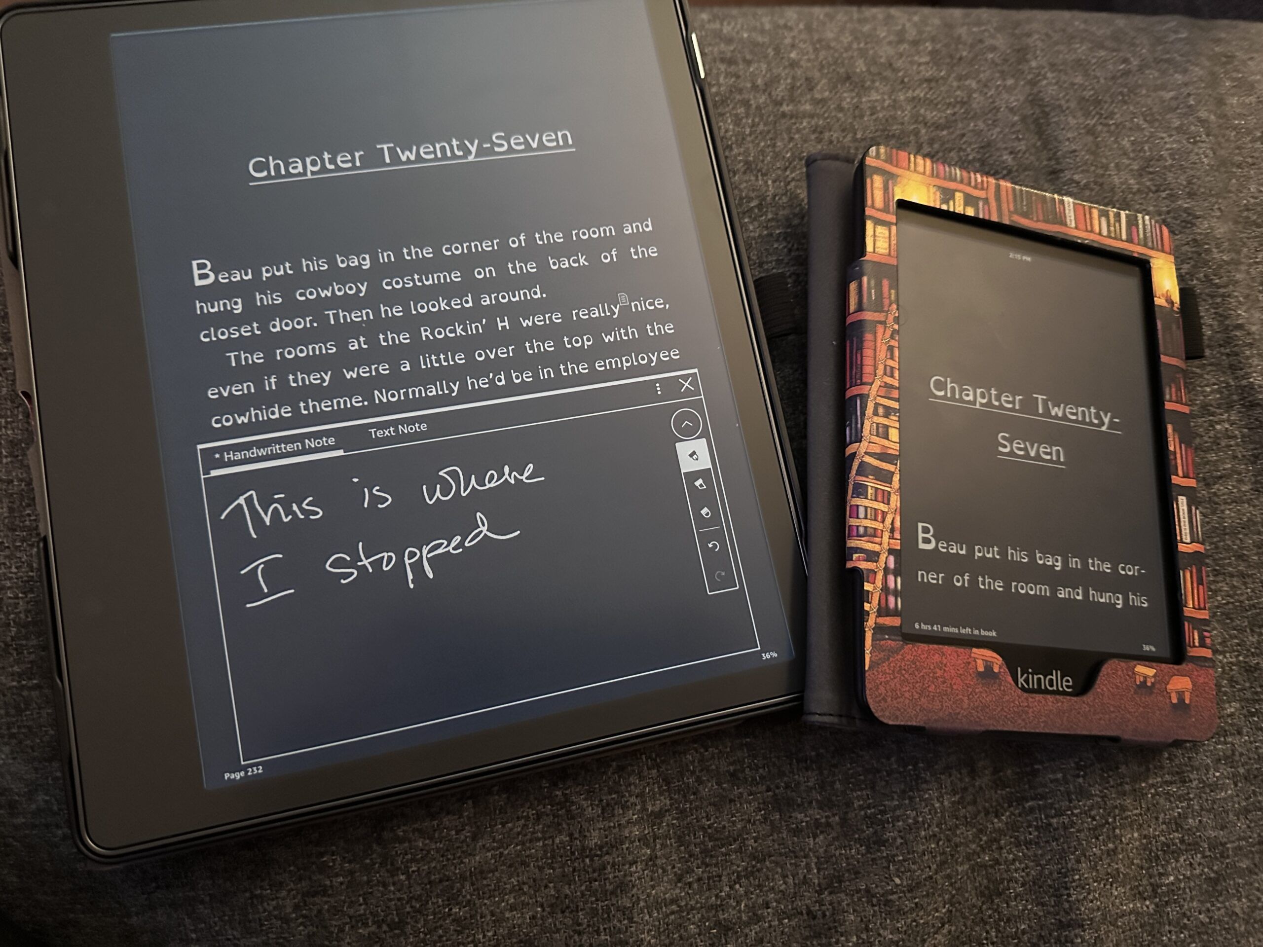 A photo of a Kindle Scribe next to a Kindle Paperwhite, both in dark mode