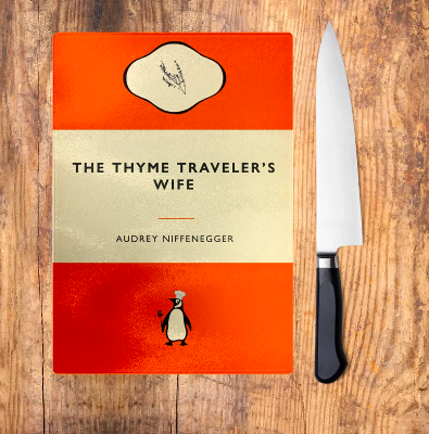 Cutting board designed to look like a Penguin Classics book cover with the title "The Thyme Traveler's Wife", with the penguin in the logo wearing a chef hat