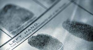 thumb prints on a police document