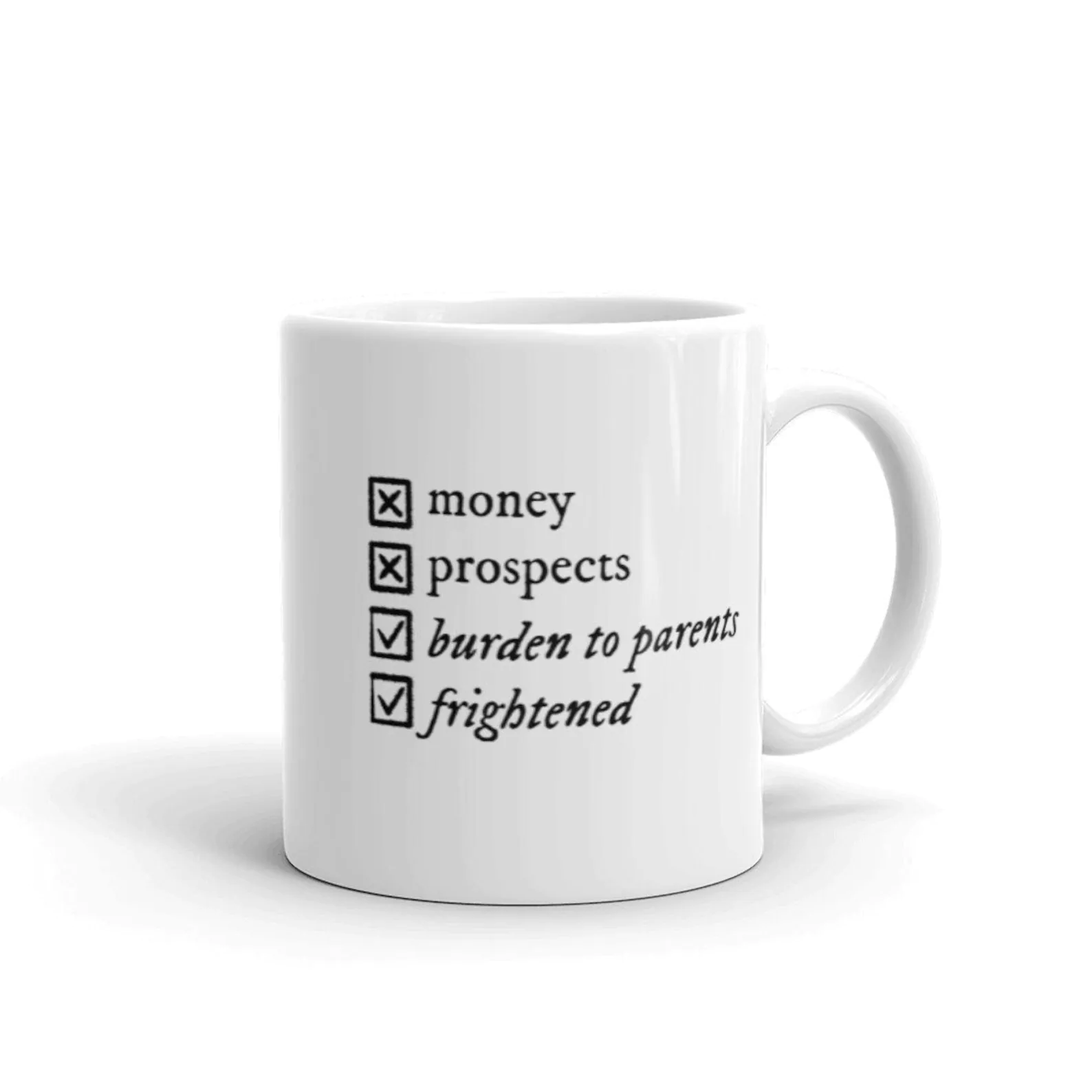 a white mug with a bullet list that reads "money, projects, burden to parents, frightened" with the last two items checked