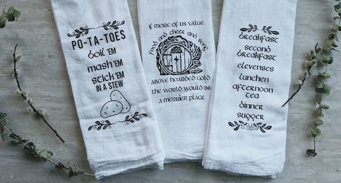 a photo of hobbit-themed tea towels