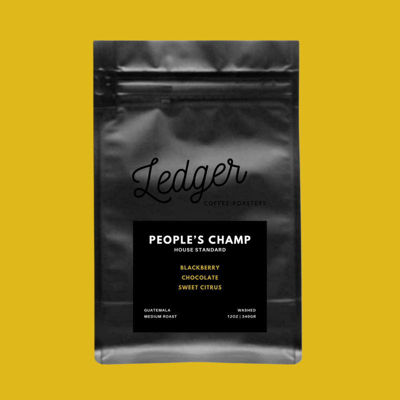 a photo of a bag of Ledger Coffee people's champ blend