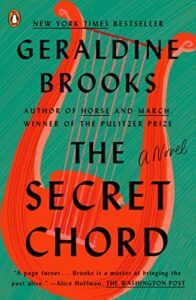 cover of The Secret Chord by Geraldine Brooks, showing an illustration of a red harp against a green background