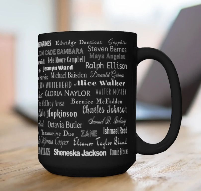 Image of a Black mug with names of Black authors on it. 