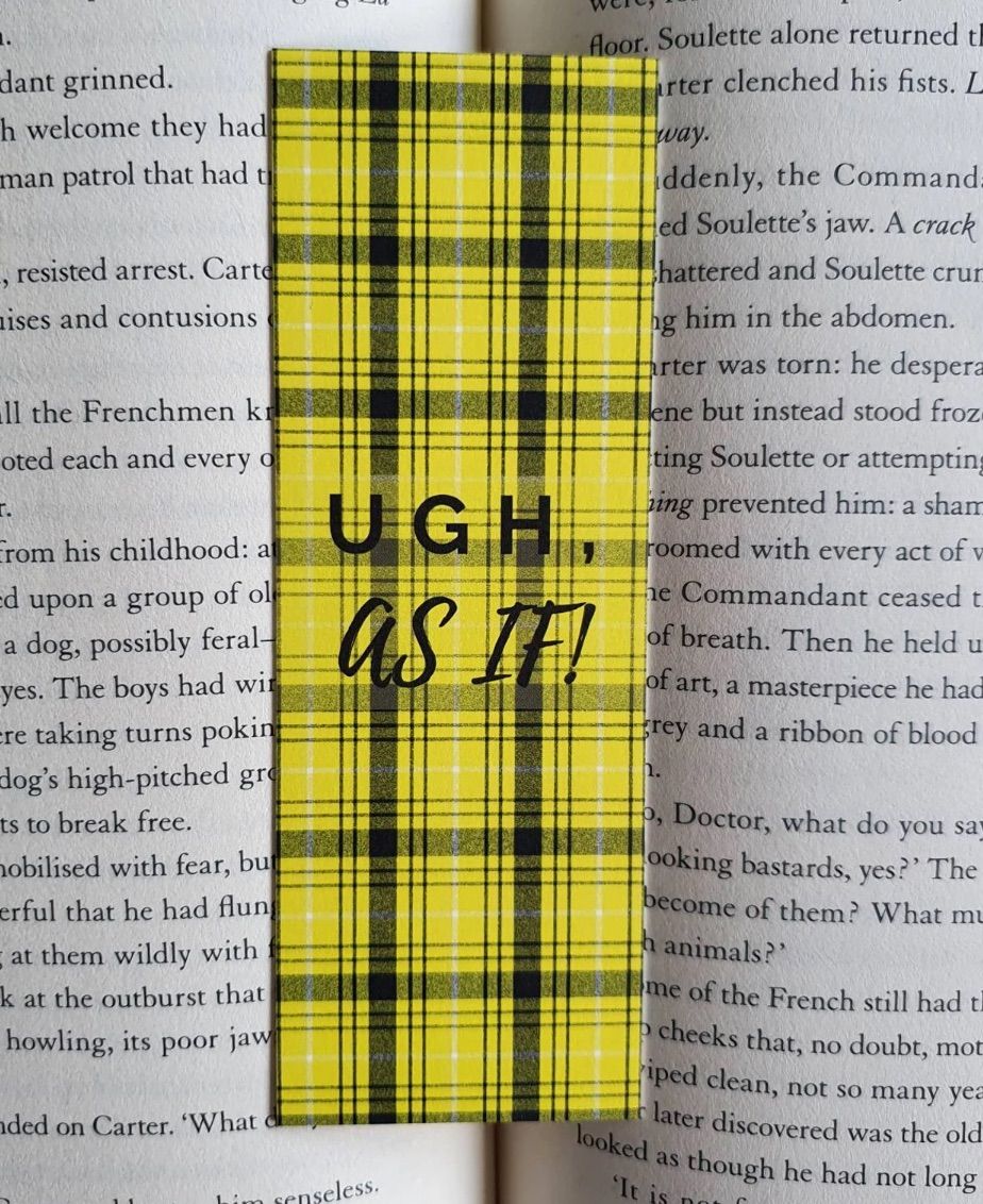 Image of a yellow and black plaid bookmark with the words 