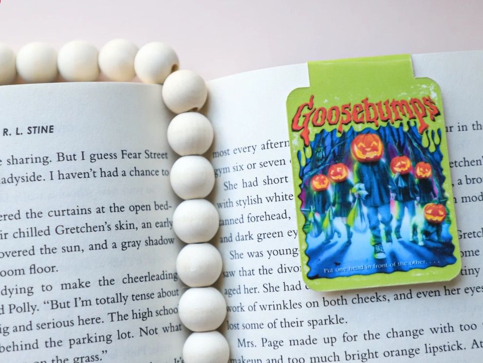 Image of a green magnetic bookmark featuring a goosebumps book cover.