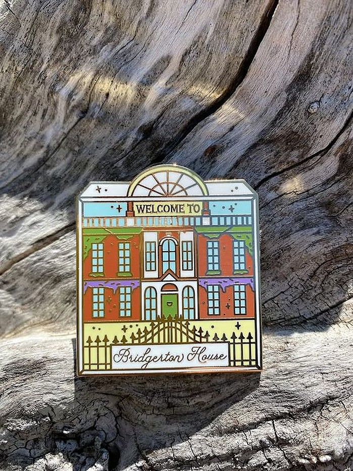 pin in the shape of a fine country home with the words 