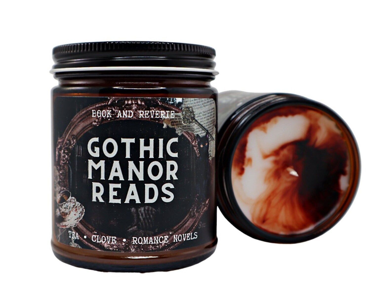 a candle with a label saying "Gothic Manor Reads" and the scents "tea, clove, romance novels"
