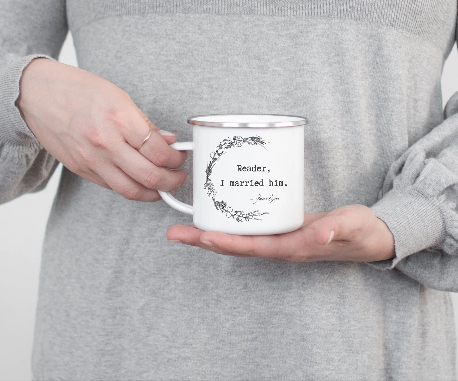 a white camp style mug that reads "Reader, I married him."