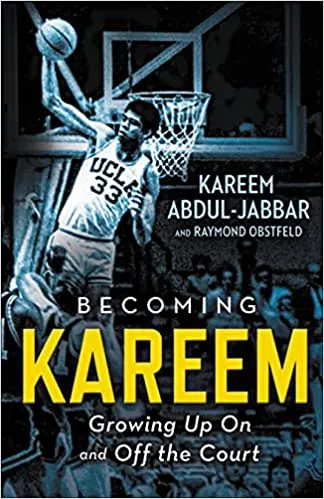 cover of Becoming Kareem: Growing Up On and Off the Court; photo of the author in his UCLA uniform jumping with the ball