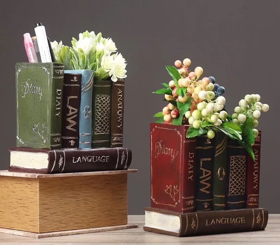 Image of book vase of old, vintage tomes. 