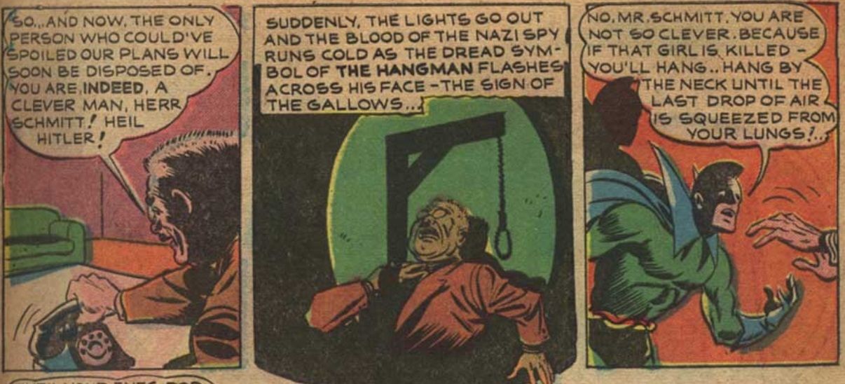 In three panels of a comic, Aa Nazi spy gasps and falls back as the shadow of the gallows -- the Hangman's call sign -- falls across the wall behind him.