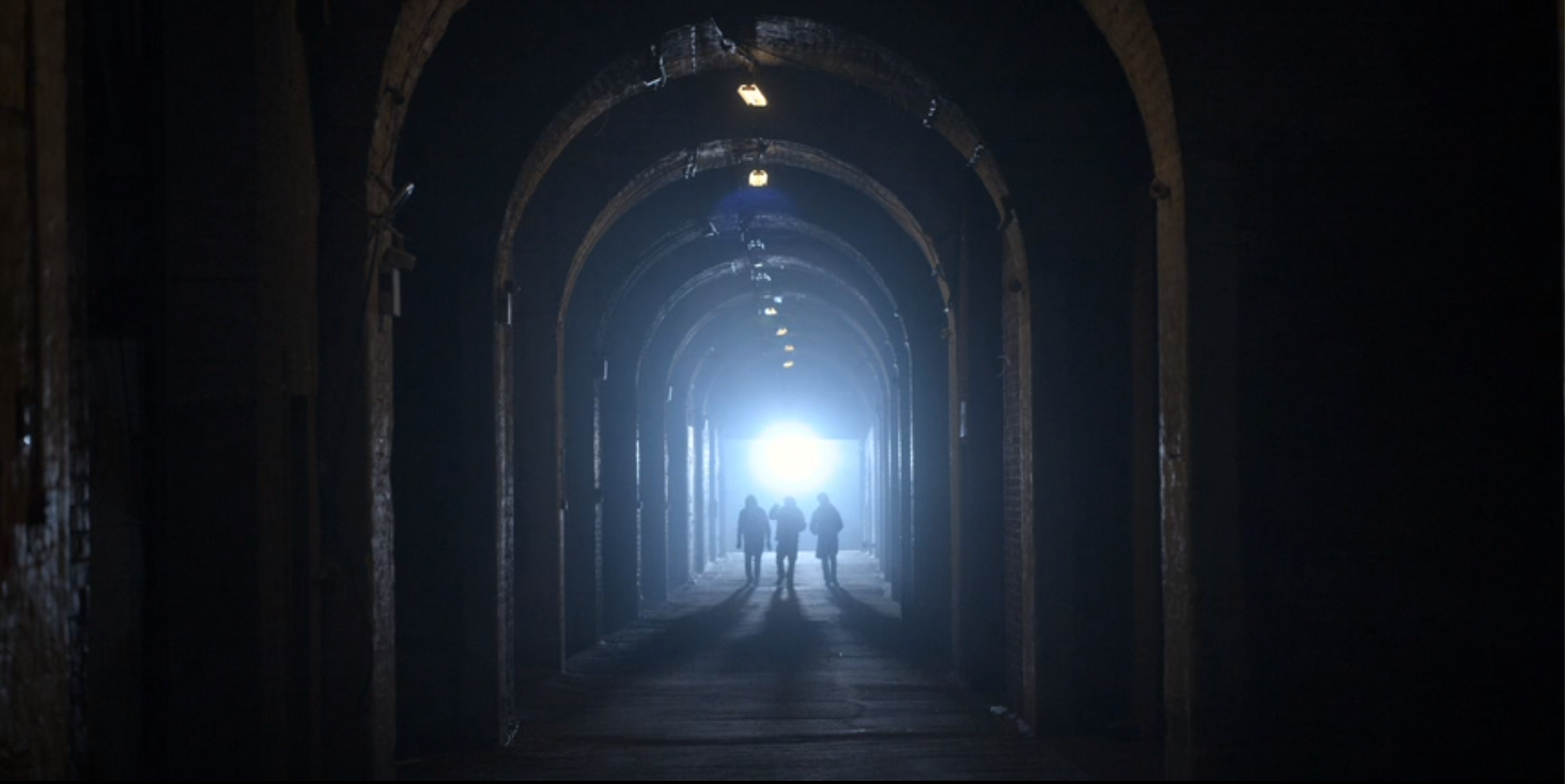 a shot of three figures in an alley from Beard After Hours