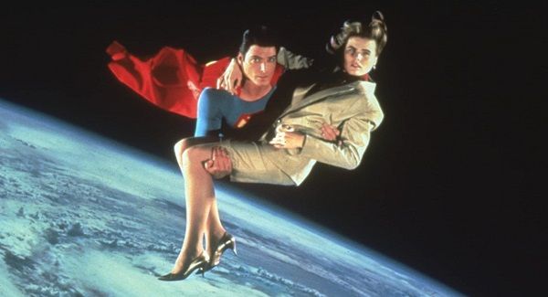 Still from Superman IV: The Quest for Peace (1987) of Superman carrying Lois as he flies over earth