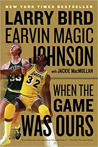 cover of When The Game Was Ours; photo of Bird and Johnson in their team uniforms