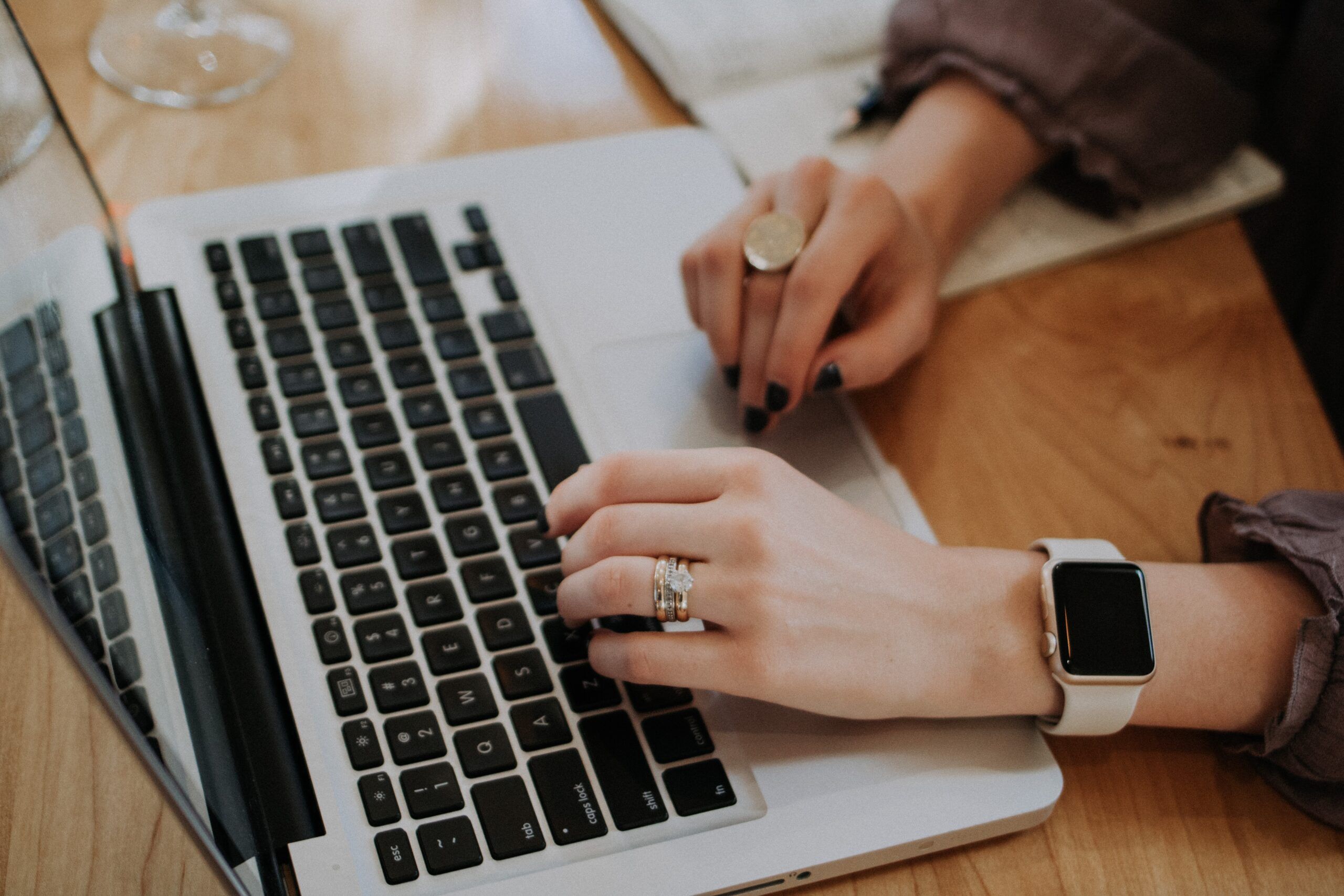 a photo of a person using MacBook