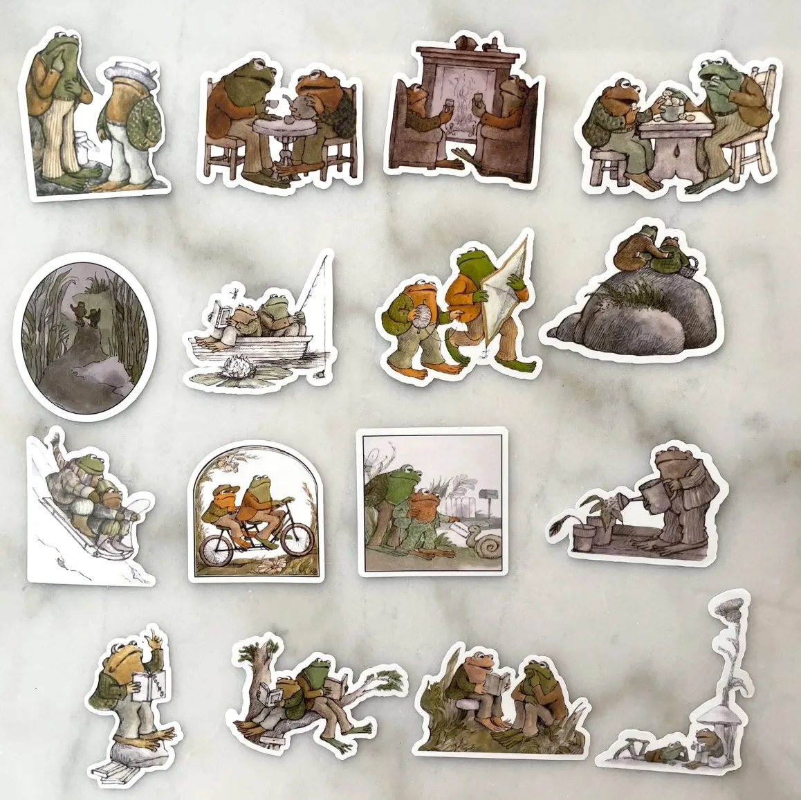 Image of 16 different Frog and Toad vinyl stickers