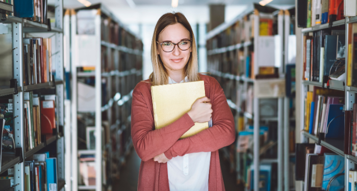 a photo of a librarian wearing a cardigan