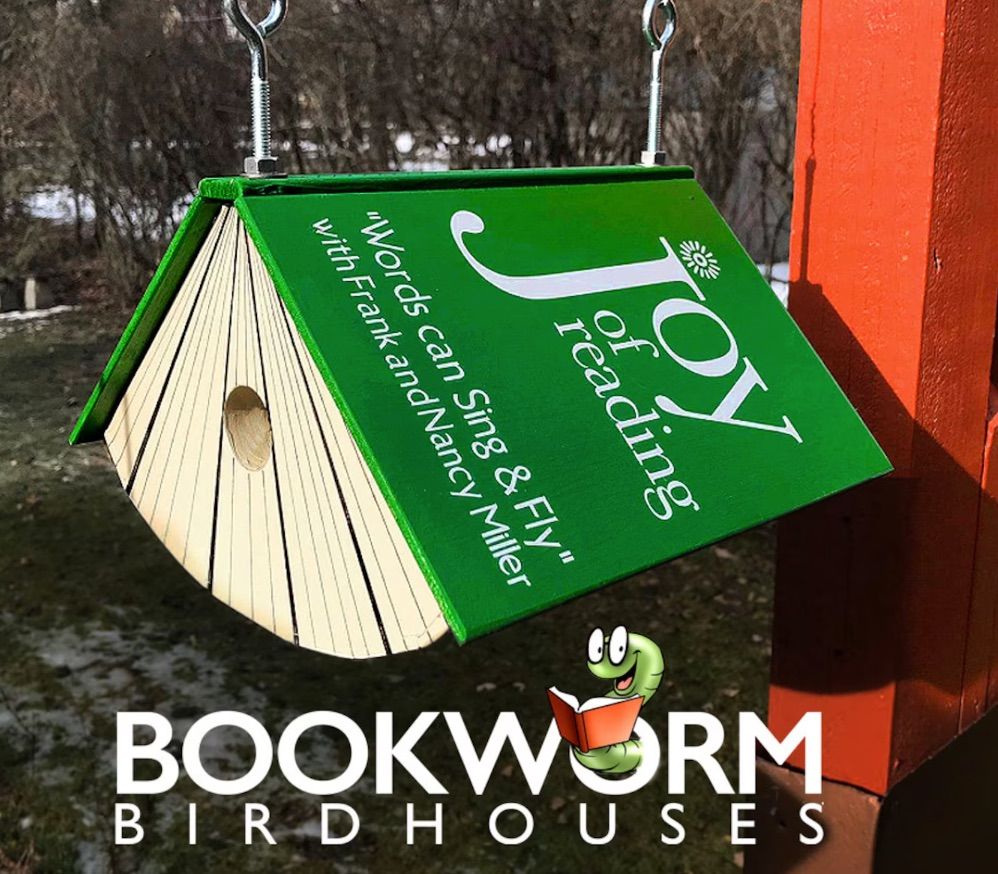 Image of a green birdhouse in the shape of a bird.