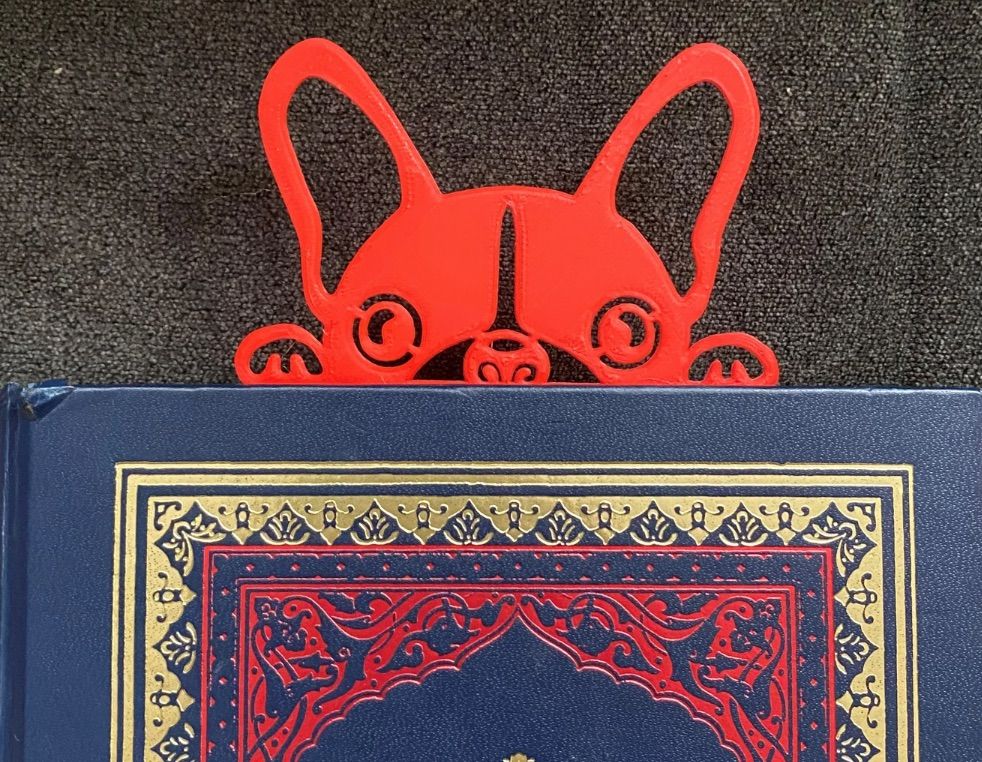 Image of a red bookmark featuring a french bulldog.