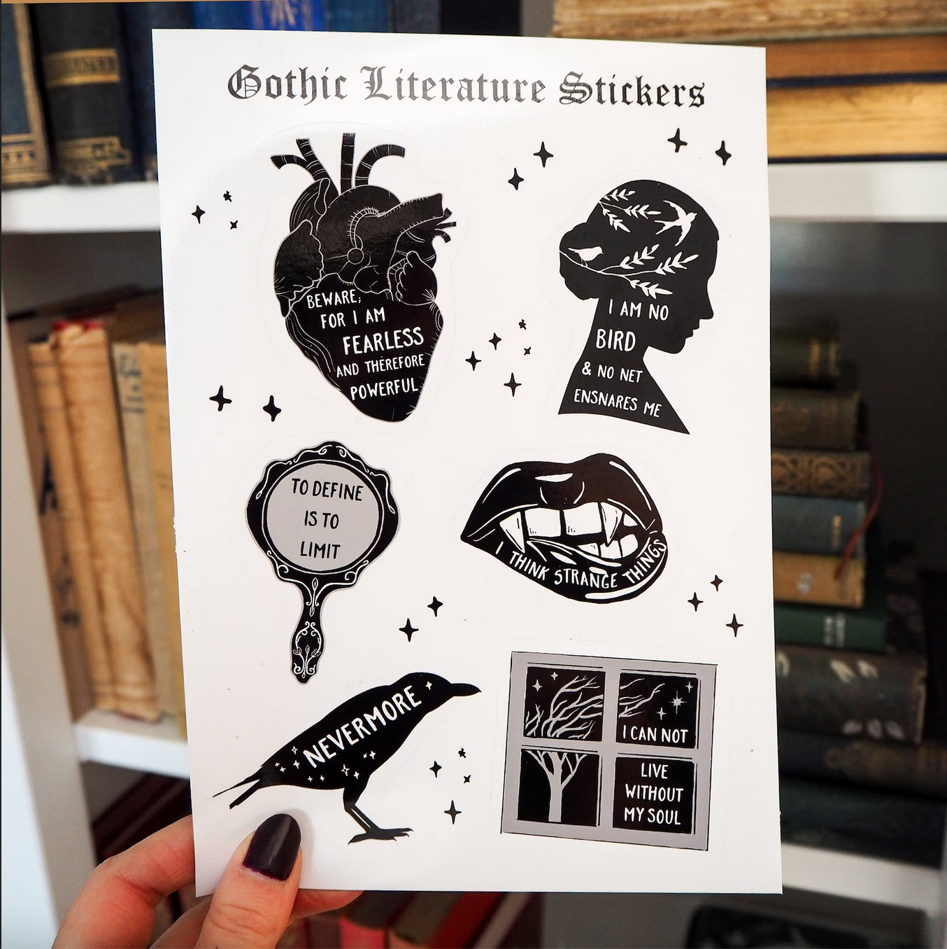 An array of black-and-white stickers with images and quotes from gothic literature.