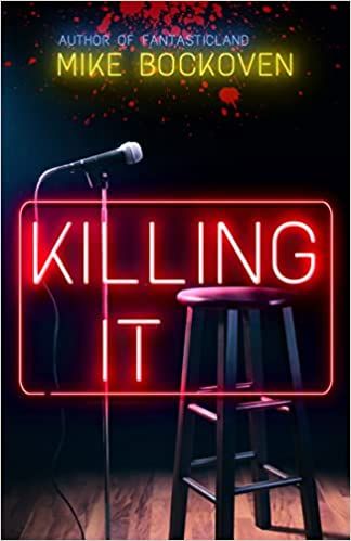 cover of Killing It by Mike Bockoven; photo of a microphone and a stool on a stage with the title in neon