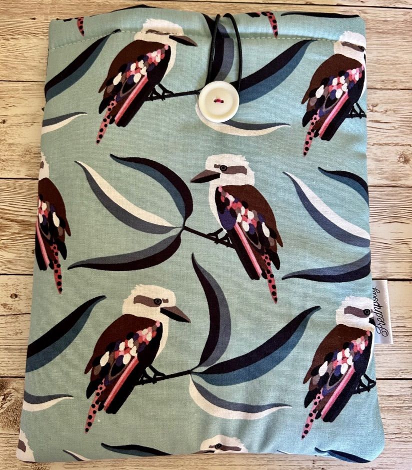 Image of a fabric book sleeve featuring kookaburras. 