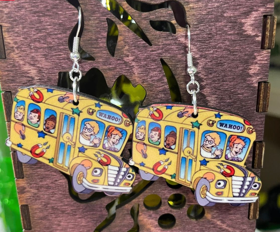 Image of earrings that pay homage to The Magic Schoolbus. 