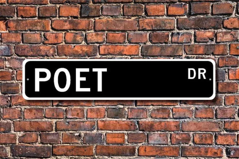 road sign that reads Poet Drive