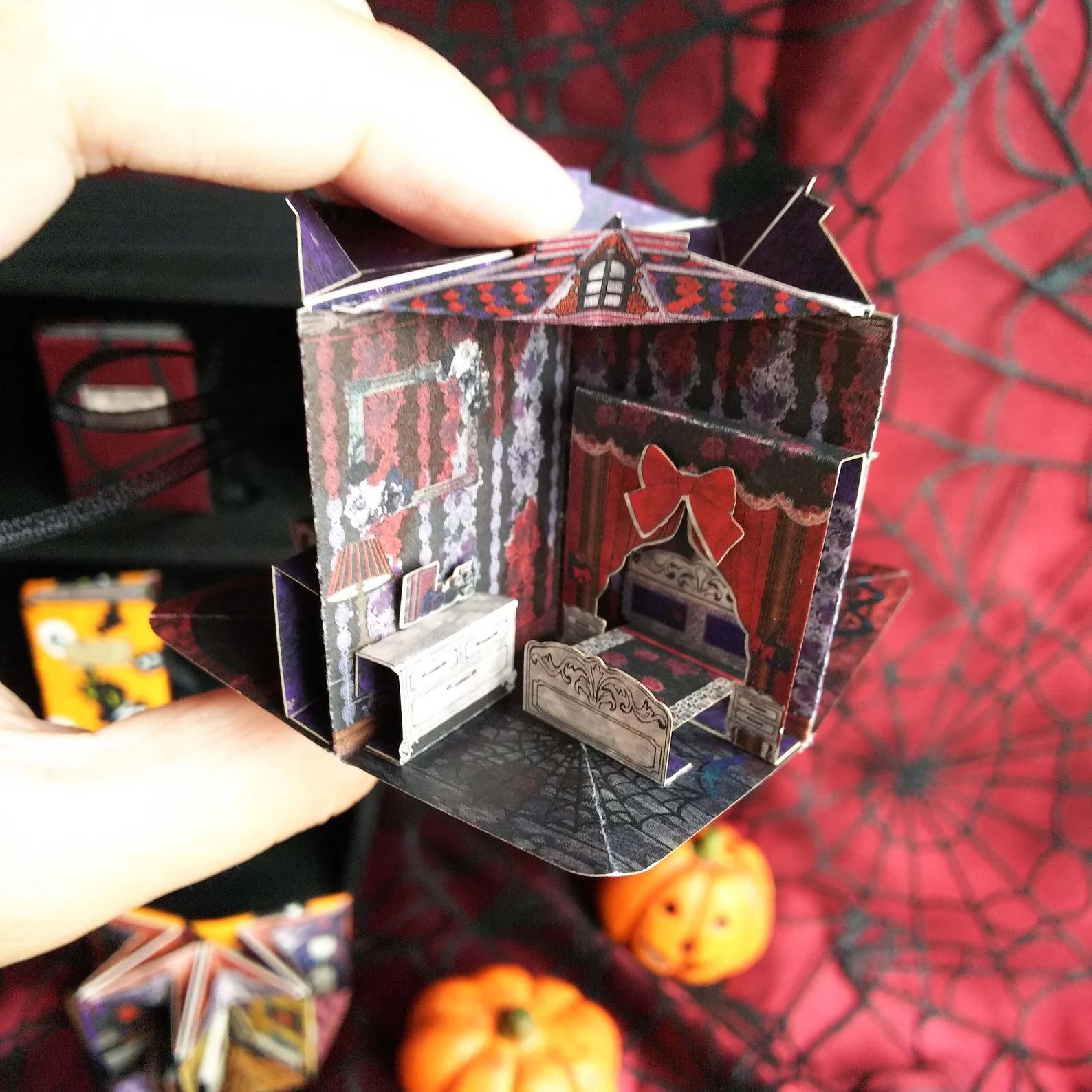 miniature pop up book that is a haunted house