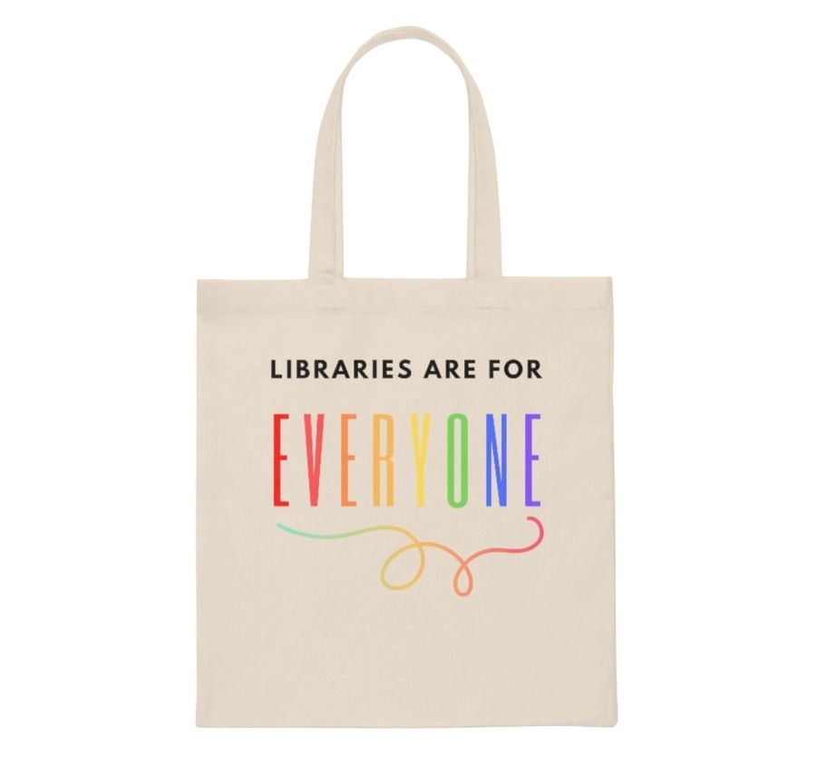 Image of a canvas tote with text that reads "libraries are for everyone," with everyone in rainbow colors. 