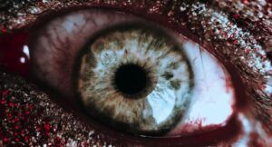 glittery red, creepy looking eye