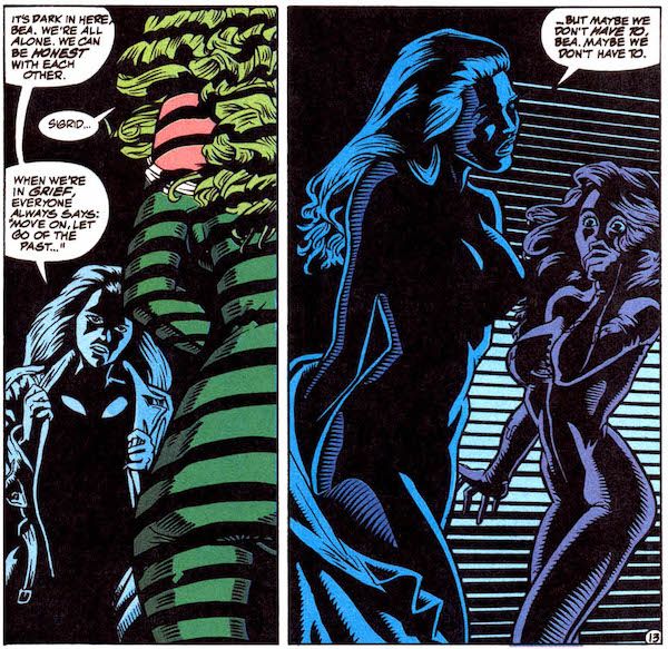 Two panels from Justice League America #103. Bea and Sigrid are in a dimly lit room, bathed in shadow.
Panel 1: Sigrid opens their coat.
Sigrid: It's dark in here, Bea. We're all alone. We can be honest with each other.
Bea: Sigrid...
Sigrid: When we're in grief, everyone always says: "Move on, let go of the past..."
Panel 2: Sigrid strips off their coat. Because of the deep shadow, they appear to be naked underneath. Bea puts a shocked hand over her mouth.
Sigrid: ...but maybe we don't have to, Bea. Maybe we don't have to.