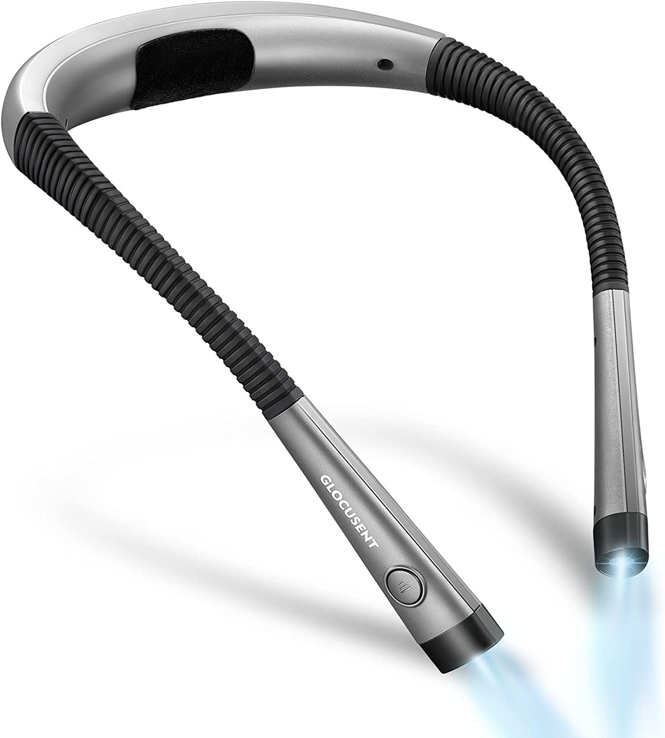 A black and silver U-shaped device with two lights shining out of the tips, designed to sit around the neck