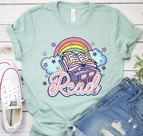 illustrated tshirt with a rainbow and book that says read