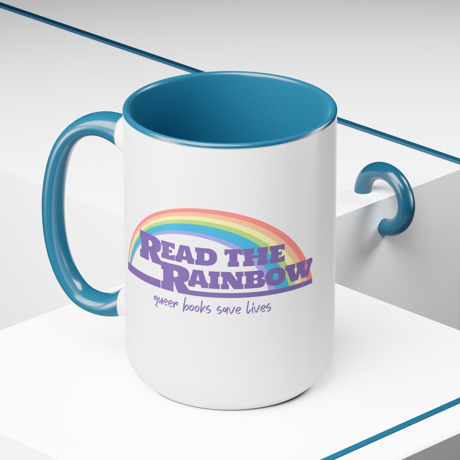 mug that says "read the rainbow" in a style similar to the reading rainbow logo. 