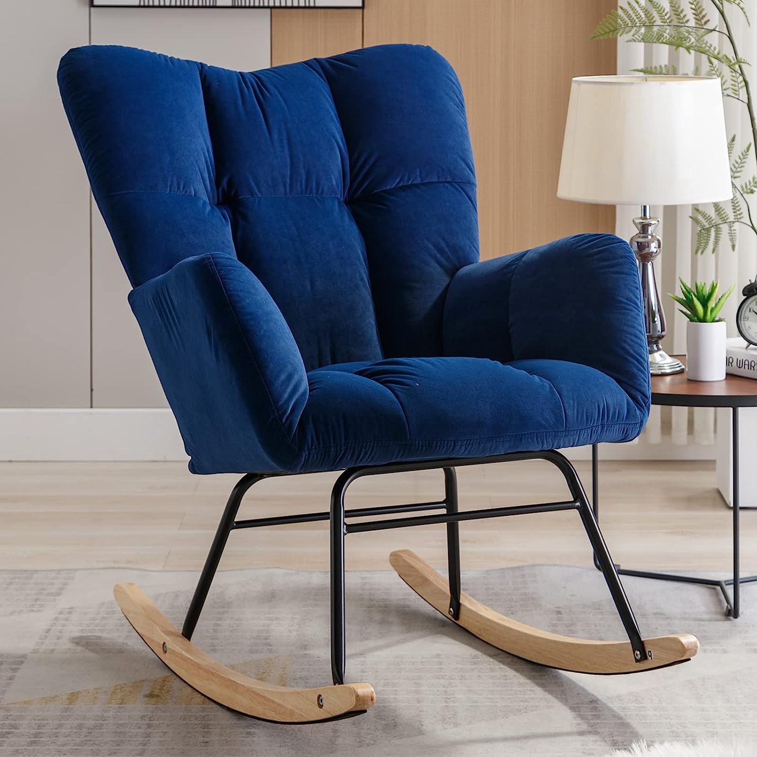 blue velvet padded rocking chair