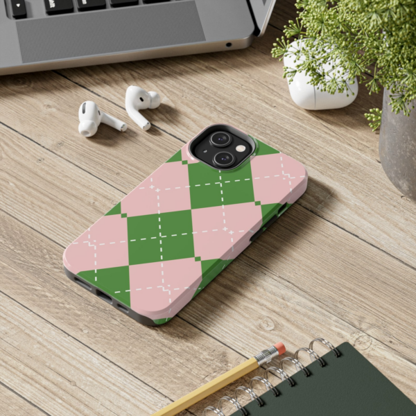 Iphone with a checkered green and pink case inspired by Alex Fierro from Magnus Chase books