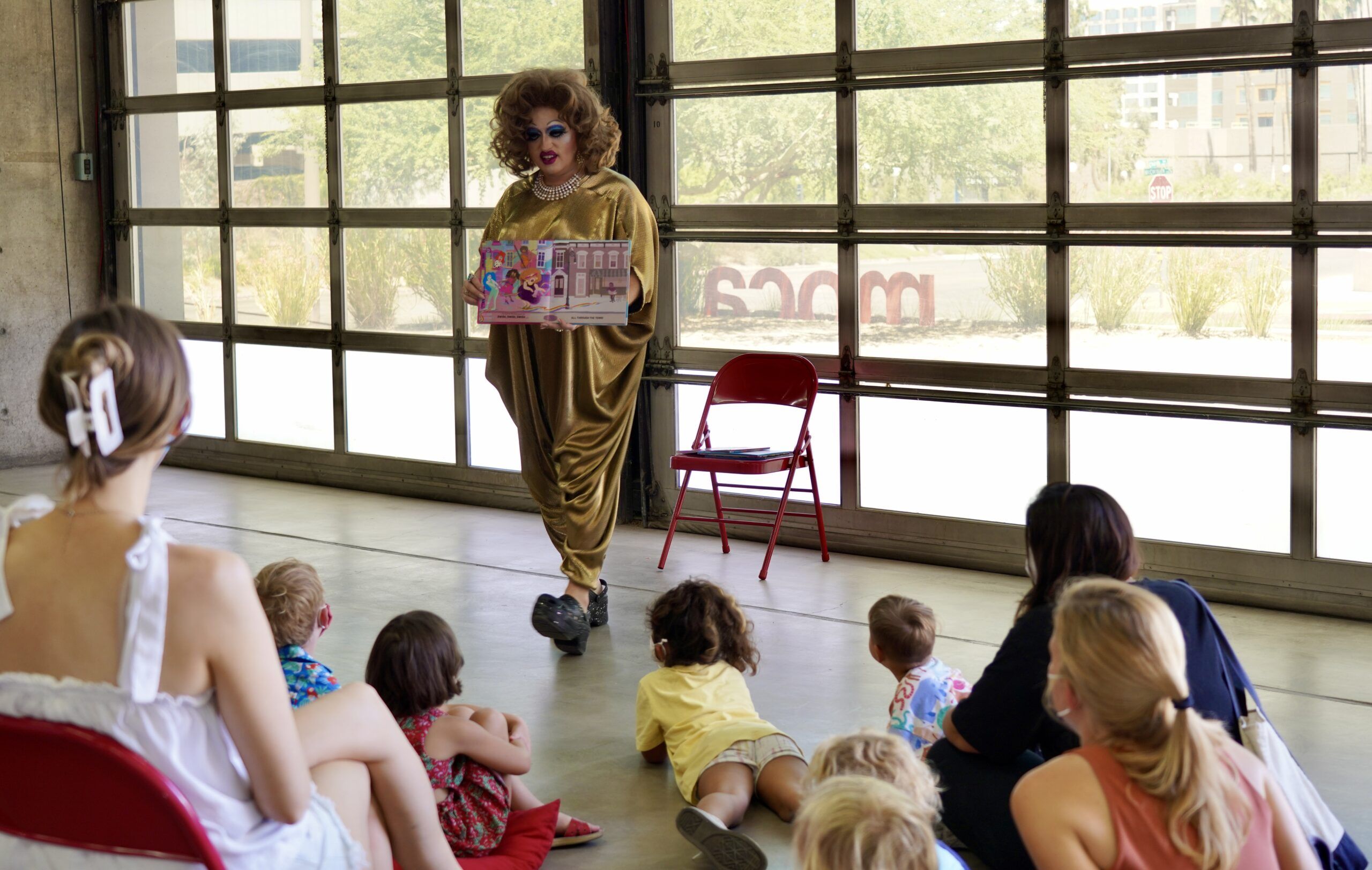 Lil Miss Hot Mess reads to children and adults from her book. Photo by Tammy Orr Wyant / MOCA Tucson.