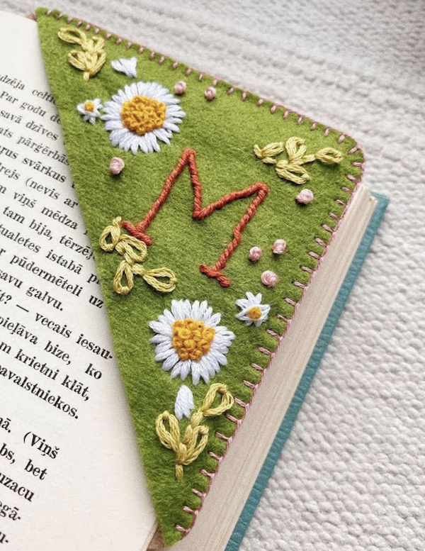 corner bookmark embroidered with flowers and the letter M