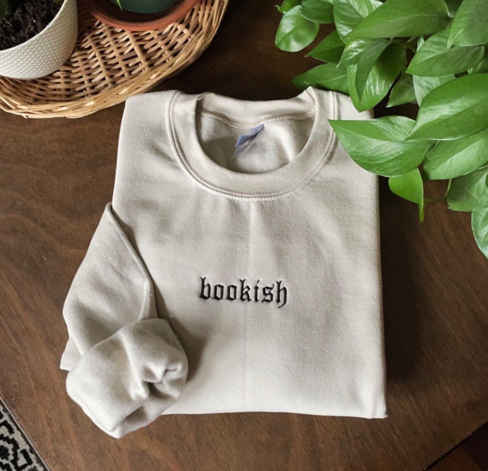 crewneck sweatshirt with bookish embroidered in a gothic font