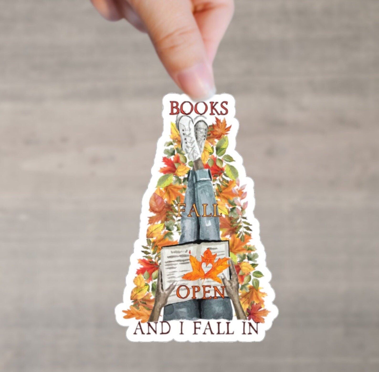 sticker of person reading book that says books fall open and i fall in