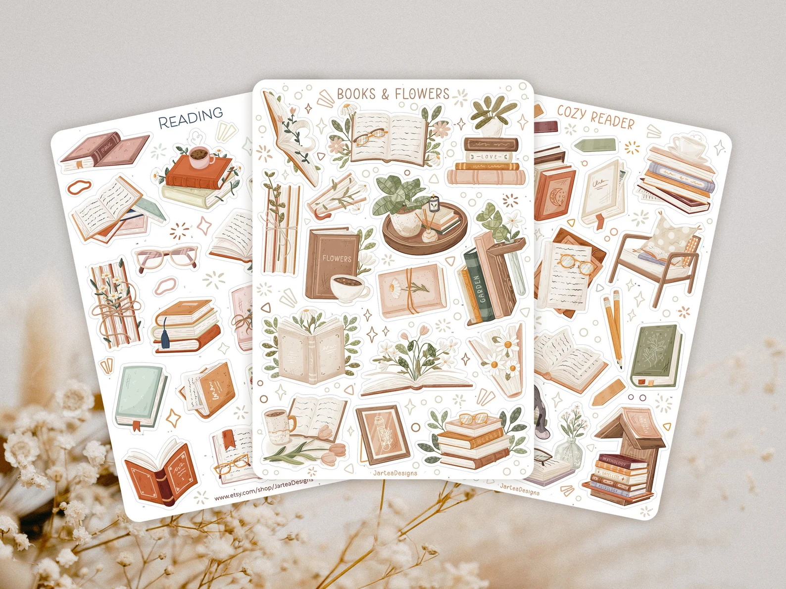 Three sticker sheets featuring earth-toned stickers of open books, books and plants, pens, reading glasses, and book stacks.