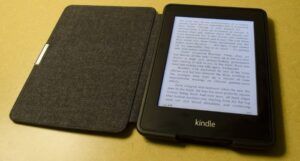 Image of a Kindle on a yellow background